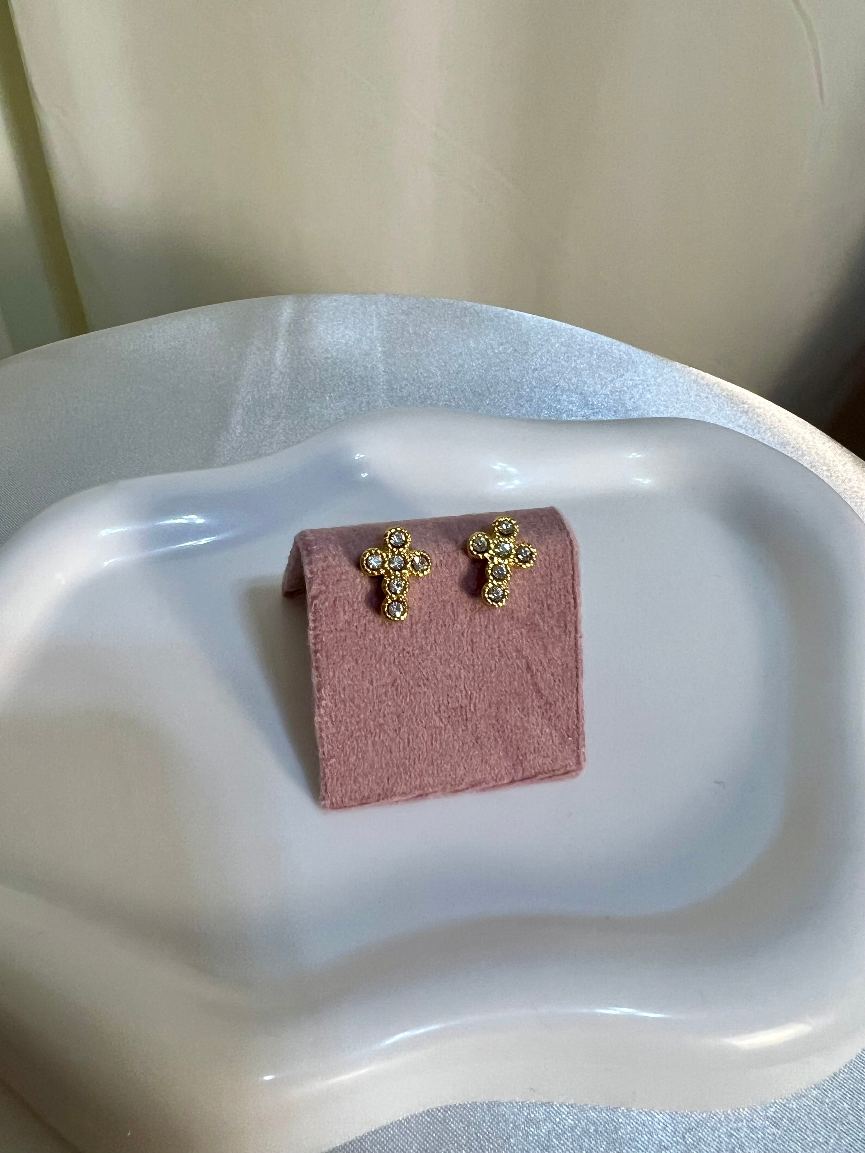 Gold cross stud earrings