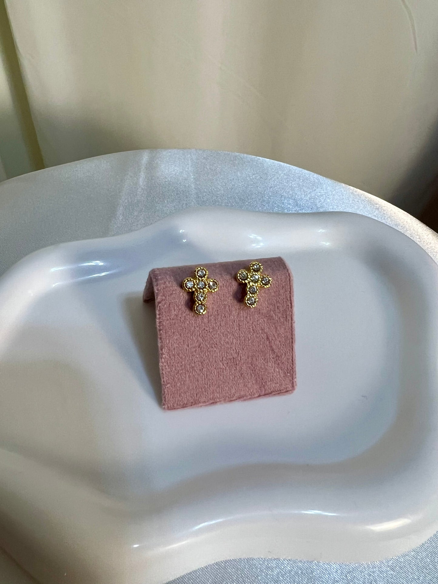 Gold cross stud earrings