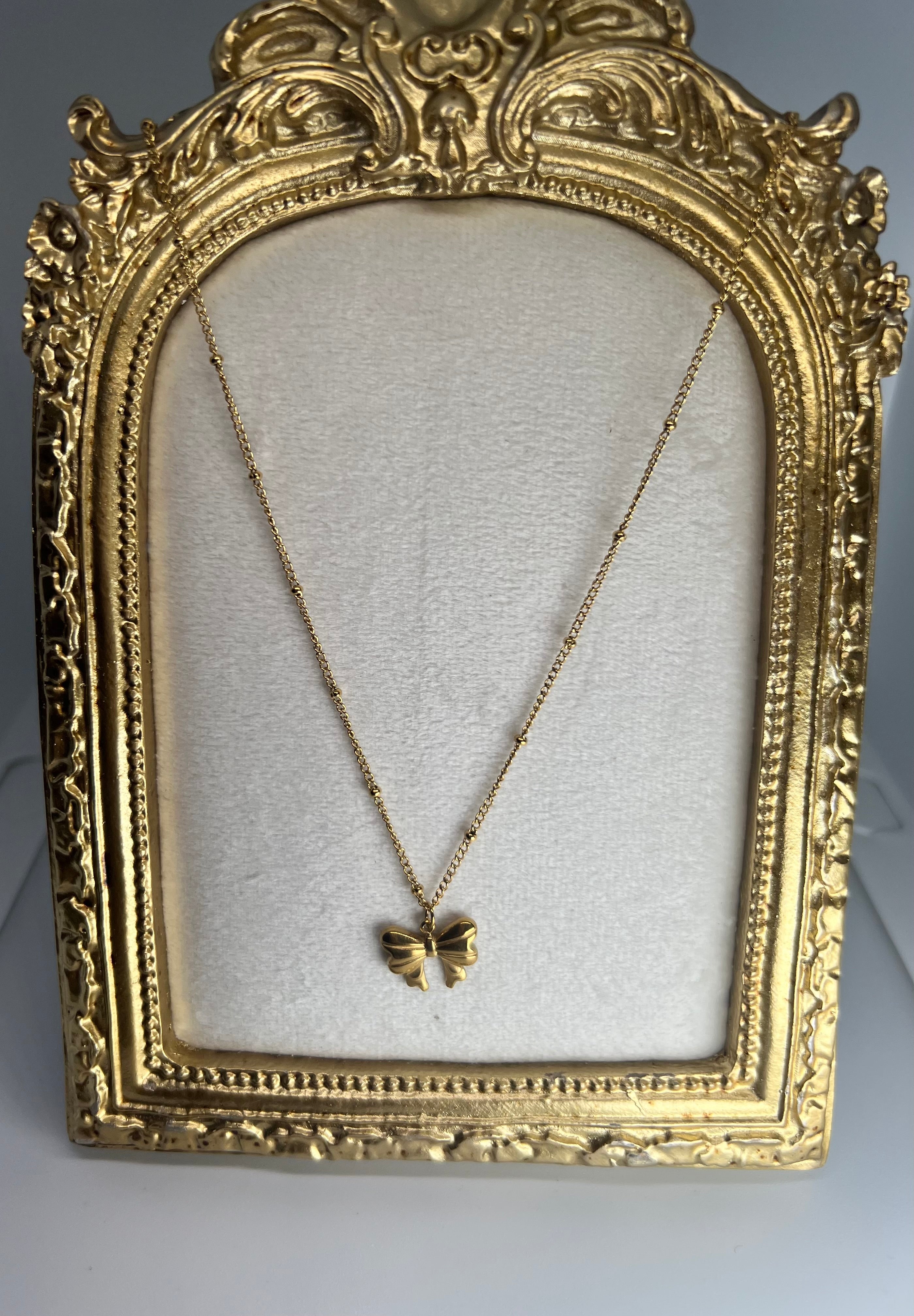Stainless steel gold bow necklace